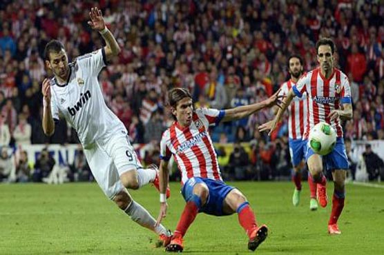 Football: Real Madrid beat Atletico to close in on final