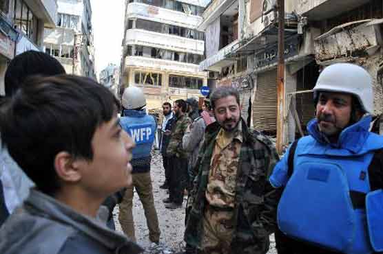 65 civilians evacuated from Syria's Homs despite fire: SANA