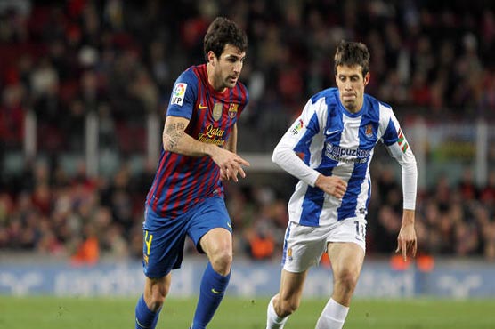 Football: Barca through to face Real Madrid in Cup final