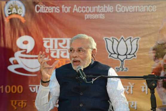 US ends boycott of India's Modi as envoy holds talks