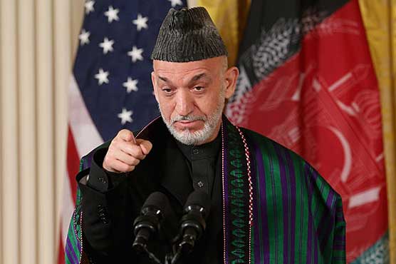 Karzai tells US to 'stop harassing' Afghanistan