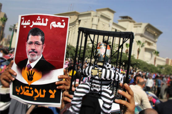 Egypt's Morsi faces spying charges as third trial to begin