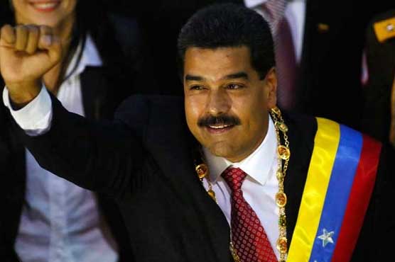Venezuelan leader challenges Obama to talks