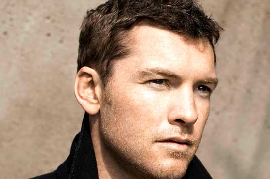 Actor Sam Worthington charged with assaulting photographer