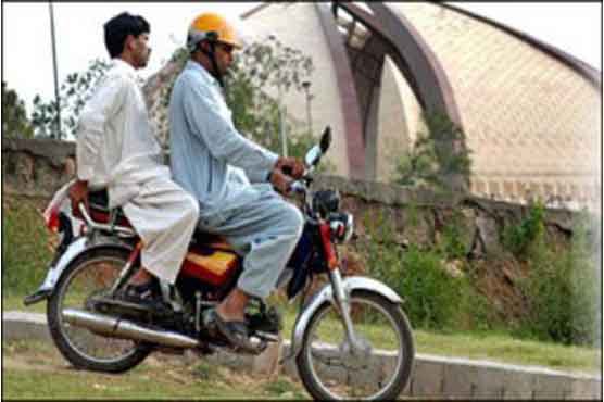 Pillion riding ban lifted in Karachi