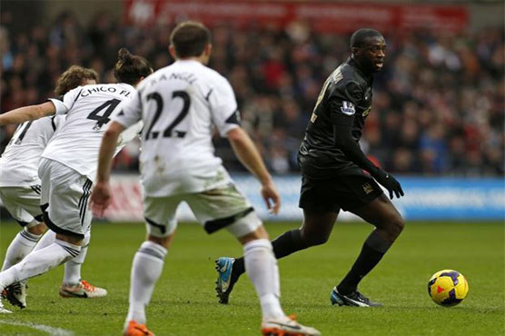 Football: City edge Swansea to take first pole of 2014