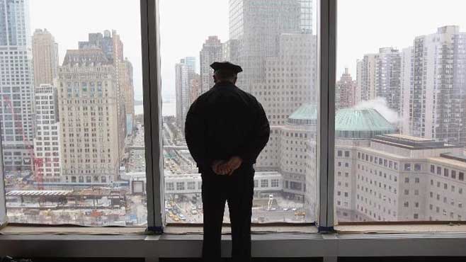 New York cops among 106 accused over 9/11 fraud