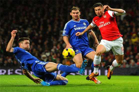 Football: Quick-fire Arsenal back on top