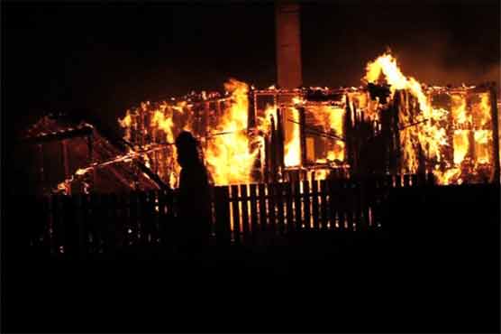 Fire rages in Norway heritage village