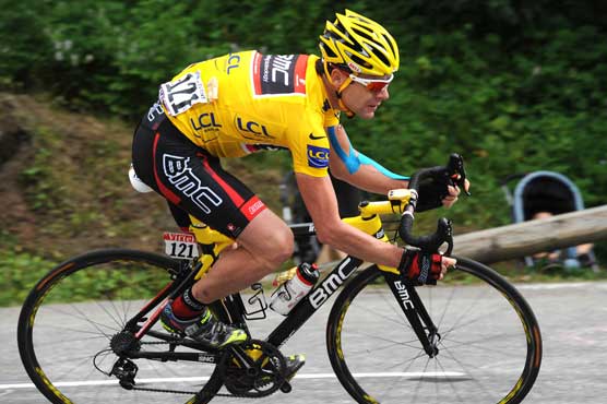 Tour de France winner Evans staying on the road at 37