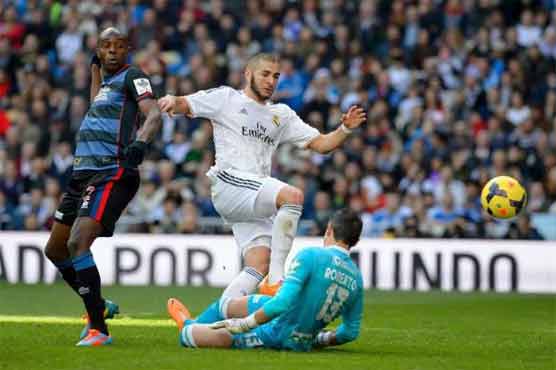 Football: Ronaldo, Benzema fire Madrid into top spot