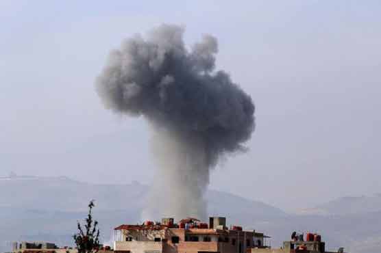 11 dead in Syria barrel bomb attacks: NGO  