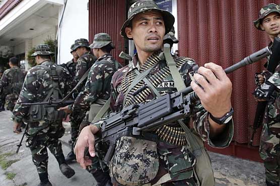Child soldiers among 53 dead as Philippine troops 