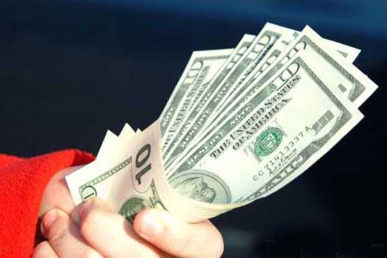 Dollar holds up ahead of Fed minutes release