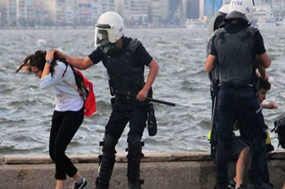 Turkish court arrests policeman in protester killing