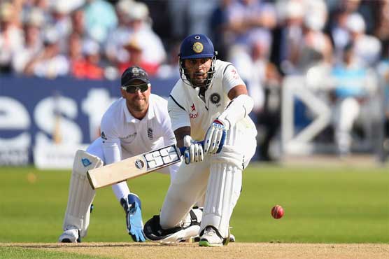 Vijay ton keeps England at bay