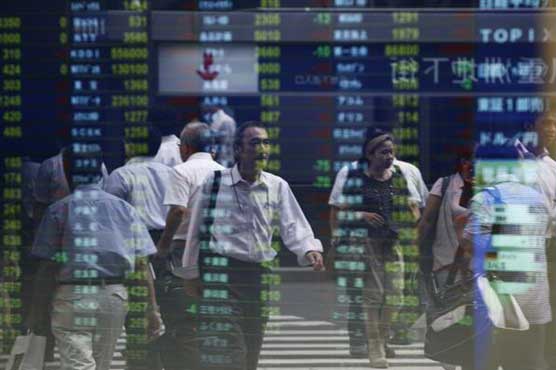 Asia shares mixed after Fed minutes, China data