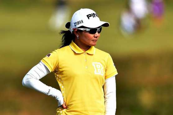 Golf: Uehara grabs lead at windswept British Open