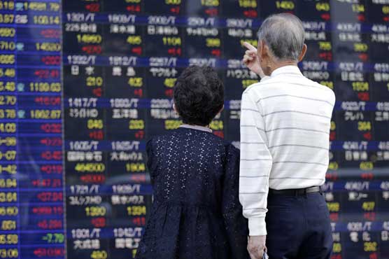 Asia shares mixed, eurozone debt fears return