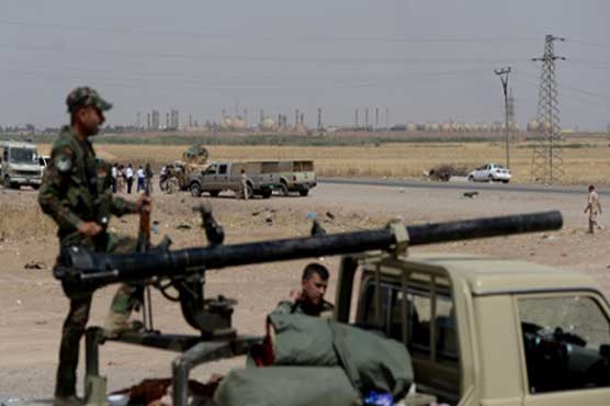 Iraq fights assault as Baghdad-Kurd row escalates