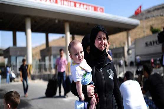 Turkey warns of 'drastic measures' against Syrian refugees