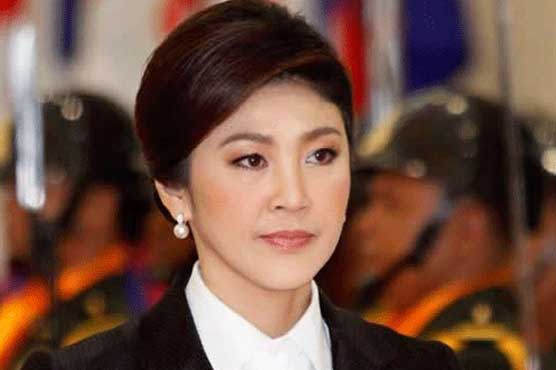Ousted Thai PM Yingluck vows not to flee