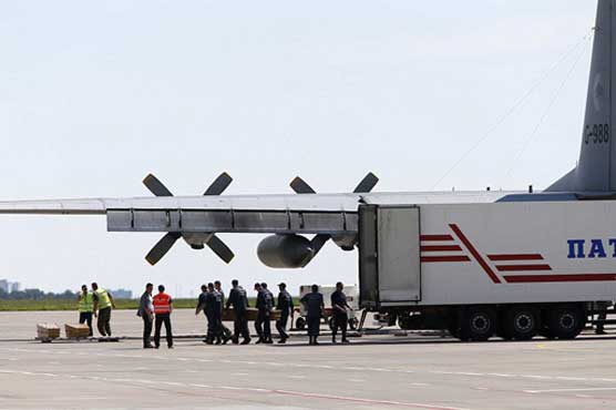 First MH17 bodies arrive in Netherlands as nation mourns