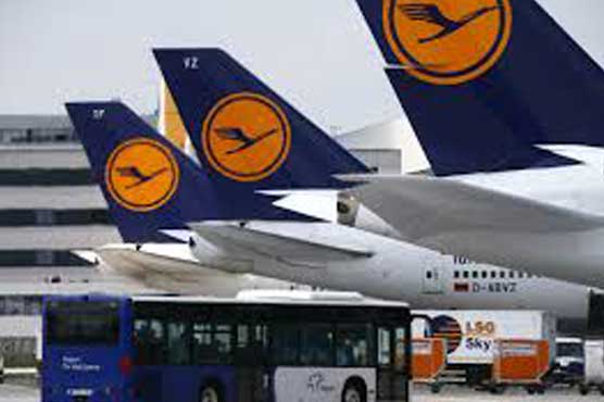 Lufthansa cuts profit target for this year, next year 