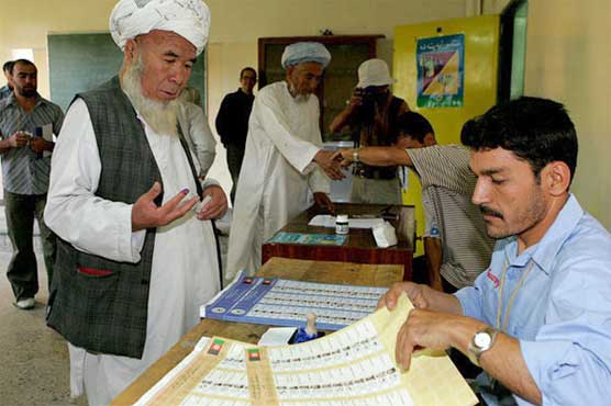 Afghans vote in run-off election despite Taliban threats