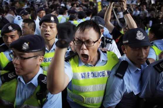 Police arrest 21 in Hong Kong new town protest