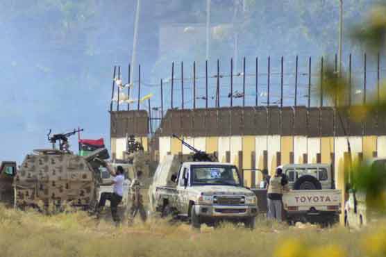 New clashes in Libya's Benghazi kill at least eight