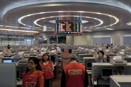 Asian shares mixed, Iraq crisis caps gains