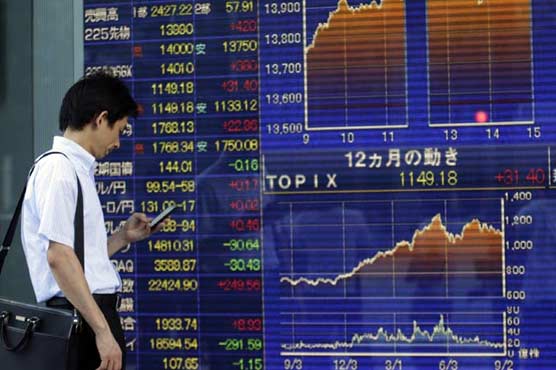 Asia shares mostly lower, weaker yen boosts Tokyo