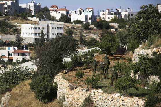 Israel presses West Bank teen hunt with 30 new arrests 