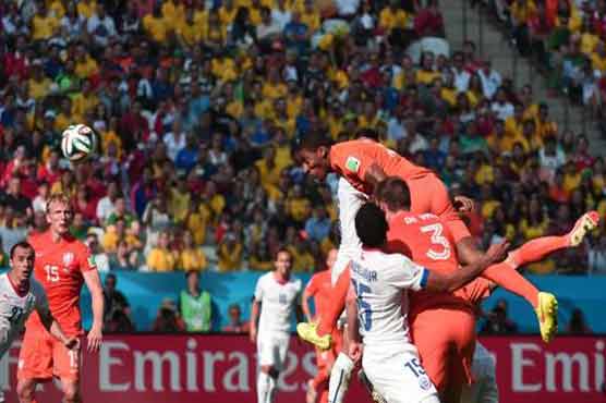 Football: Super-subs sink Chile as Dutch top group