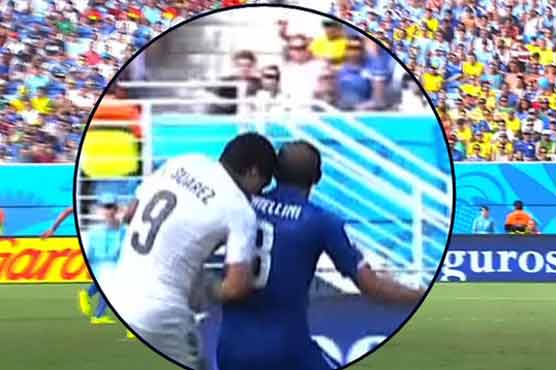 FIFA probes Suarez for biting rival in World Cup game
