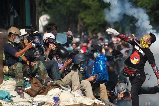 Thai protesters retreat but crisis 'not over'