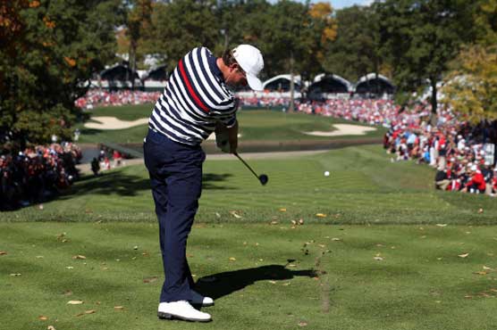 Golf: Webb stares down challengers in Singapore 