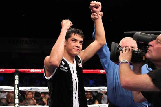 Boxing: Figueroa title defense off due to hand injury