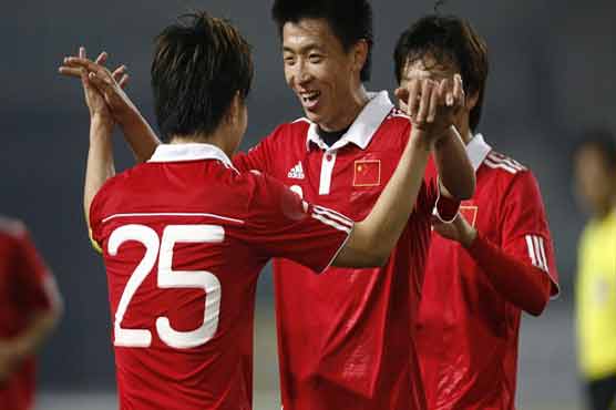 Football: China survive huge scare to reach Asian Cup   
