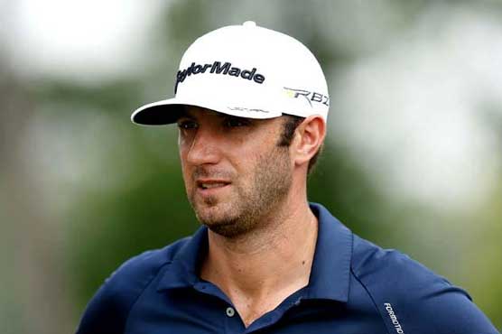 Four share lead at windy WGC, McIlroy lurks