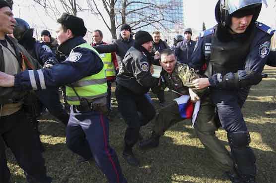 Clashes in Ukraine as Putin stays defiant