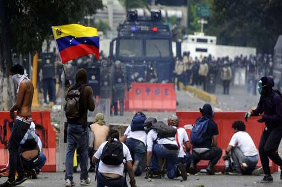 Venezuela cracks down as protests rage on 