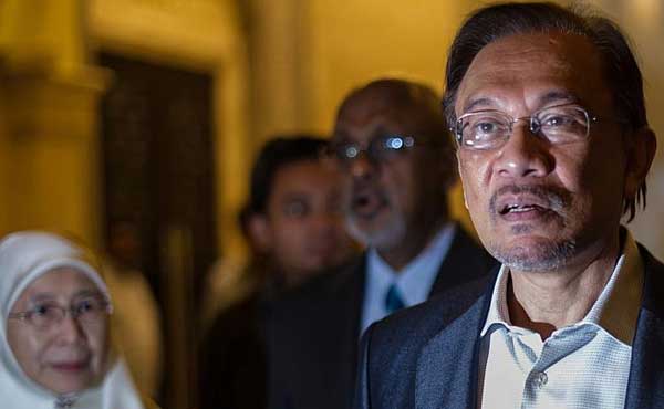 'Disgusted' by speculation over missing plane's pilot, says Anwar Ibrahim 