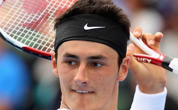 Tomic trounced in record fashion