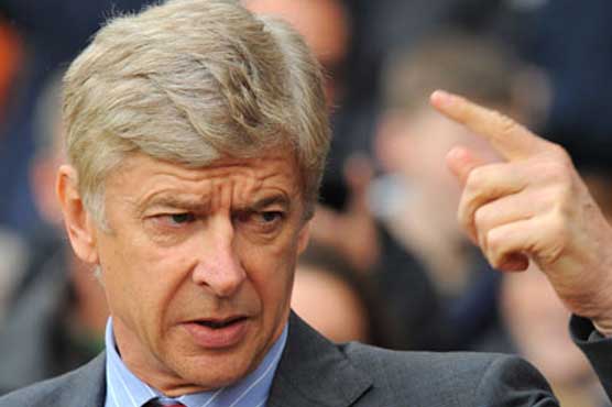 Football: I'm not going anywhere, says Wenger