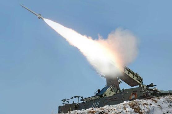 North Korea test-fires 16 rockets into sea