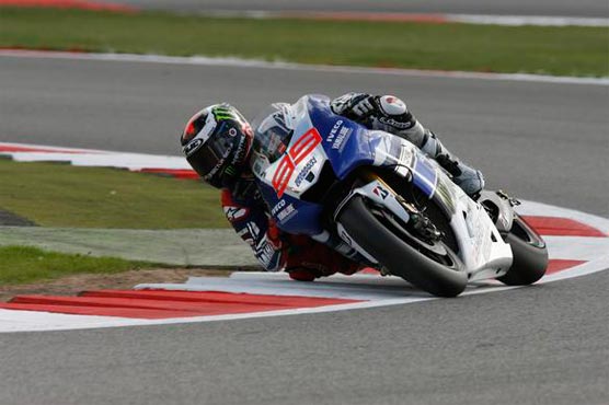 Motorcycling: Marquez edges Rossi to win Qatar Grand Prix