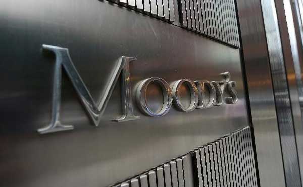 Moody's puts Russia on review for downgrade