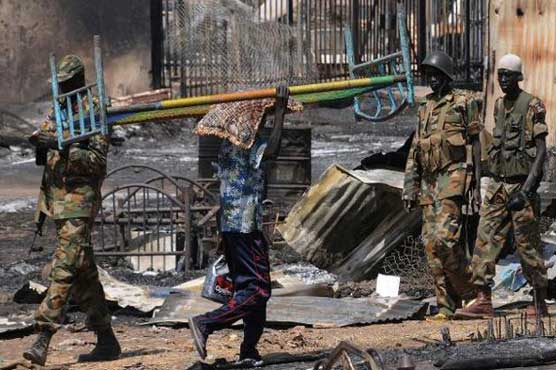 South Sudan army battles rebels for key oil town